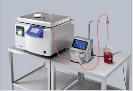 A pump connected to a media preparator